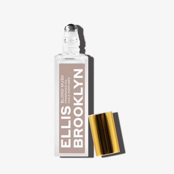 Blond Musk Fragrance Oil 15ml with cap removed on white background.