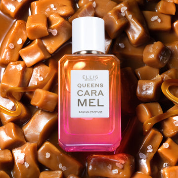 Queens Caramel 50ml Eau De Parfum on cubes of caramel, melted caramel, and pink salt. | english_image