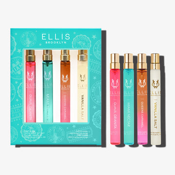 FIRST CLASS Gift Set containing GUAVA GRANITA Eau de Parfum 10ml, MIAMI NECTAR Eau de Parfum 10ml, QUEENS CARAMEL Eau de Parfum 10ml, and VANILLA SALT Eau de Parfum 10ml on a white background | english_image