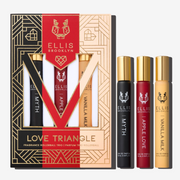 Black, red, beige and gold Love Triangle Fragrance Rollerball Trio Box showing Myth 10ml Fragrance Rollerball, Apple Love 10ml Fragrance Rollerball, and Vanilla Milk 10ml Fragrance Rollerball, on white background.