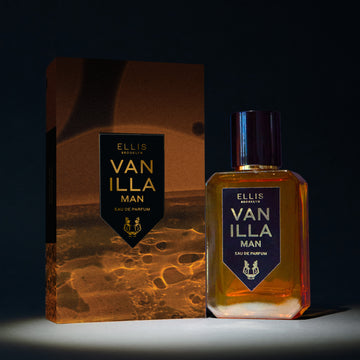Vanillla Man 50ml Eau De Parfum next to Vanilla Man Eau De Parufm box in spotlight, on black background. | english_image