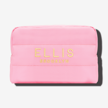 Pink Cosmetic Bag with gold embroidery that reads "Ellis Brooklyn" on white background | english_image