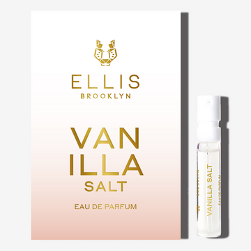 Vanilla Salt 1.5ml Eau De Parfum Vial next to white and pink ombre Vanilla Salt Eau De Parfum vial holder card. | english_image