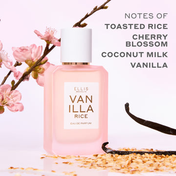 VANILLA RICE Eau de Parfum 50ml next to toasted rice, vanilla beans, and pink sakura blossoms on a pink background with gray text that reads 
