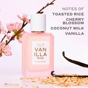 VANILLA RICE Eau de Parfum 50ml next to toasted rice, vanilla beans, and pink sakura blossoms on a pink background with gray text that reads 